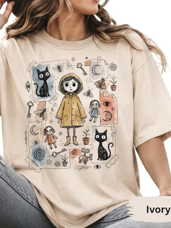 Comfort Colors Tops - Comfort Colors Ivory Graphic Tee with Whimsical Cat & Coraline Doll Art